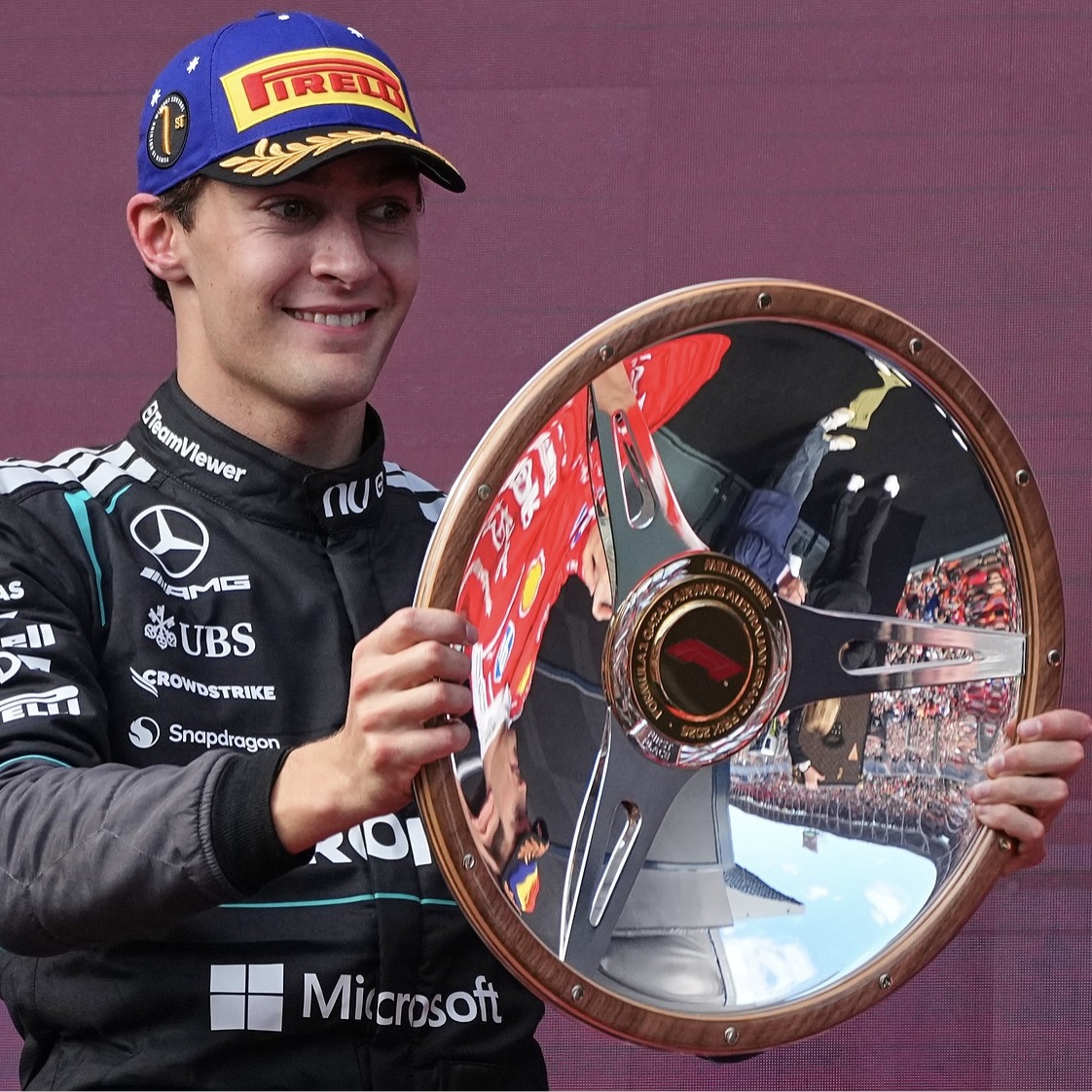 George Russell with the Australian Grand Prix first-place trophy